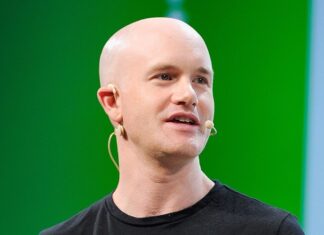 Coinbase Cuts 14% of Staff as AI and Crypto Downturn Reshape Its Operating Model